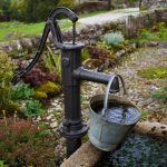 Bucket of Water Overflowing